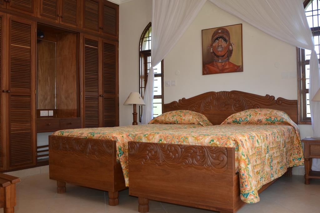 Апартаменти Diani Pearl Діані-Біч Номер фото